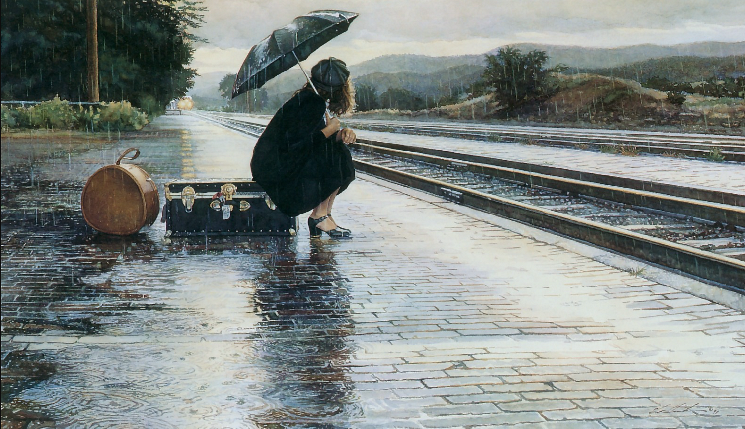 Woman waiting in the rain at train station